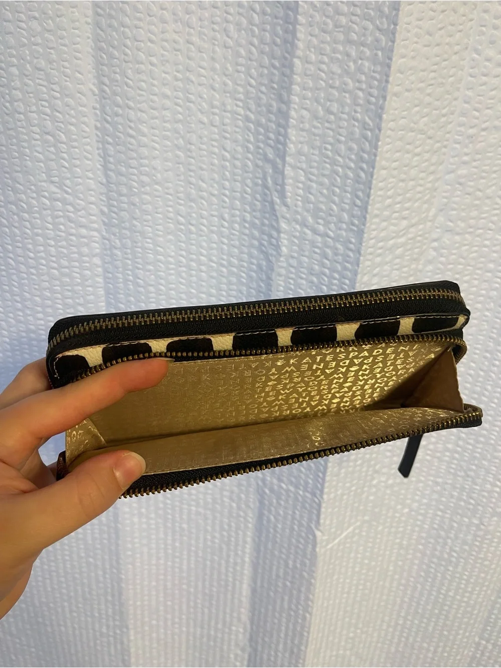 38. Large Kate Spade wallet wristlet.